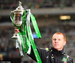 Neil Lennon holds aloft the Scottish Cup, a trophy he won six times Image: dailymail.co.uk